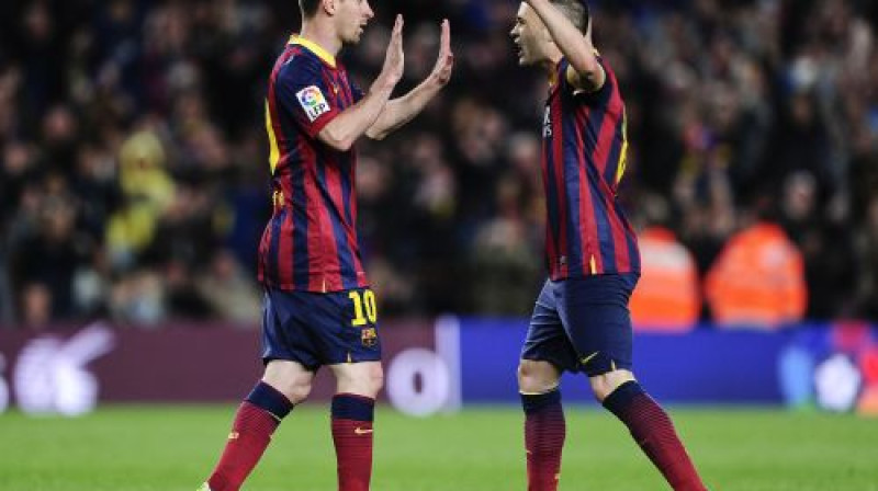 Lionels Mesi un Andress Injesta
Foto: AFP/Scanpix