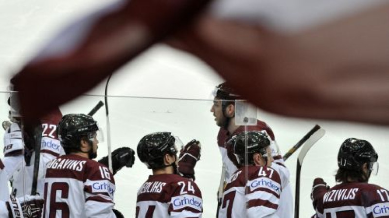 Latvijas izlases hokejisti atzīmē pirmo vārtu guvumu
Foto: Romāns Kokšarovs, Sporta Avīze, f64