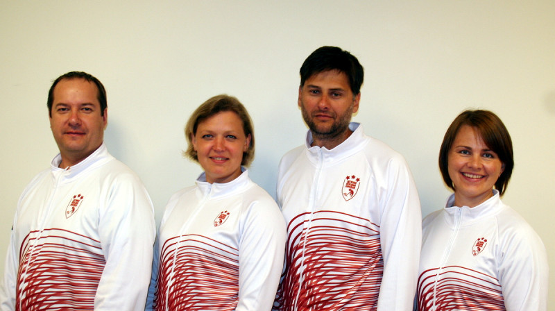 Kārlis Smilga, Iluta Linde, Arnis Veidemanis, Vineta Smilga. 
Foto: Latvijas Kērlinga Asociācija