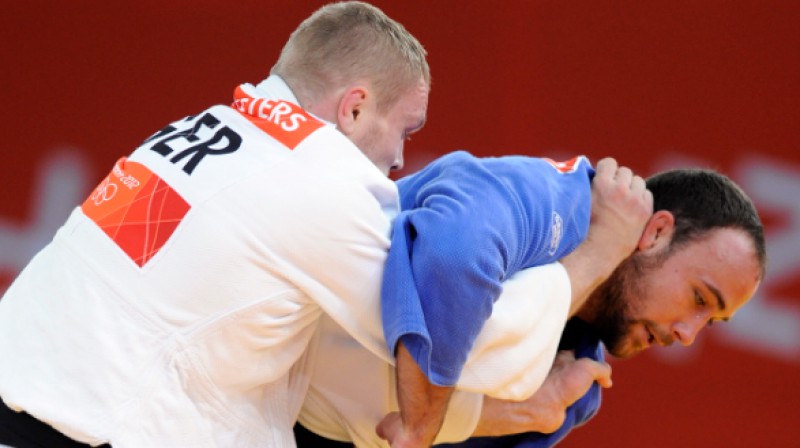 Dimitrijs Peterss un Jevgeņijs Borodavko olimpiskajās spēlēs (2012)
Foto: Romāns Kokšarovs, Sporta Avīze, F64