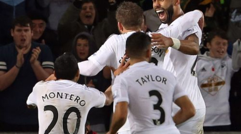 "Swansea" spēlētāji pēc vārtu guvuma
Foto: AFP/Scanpix