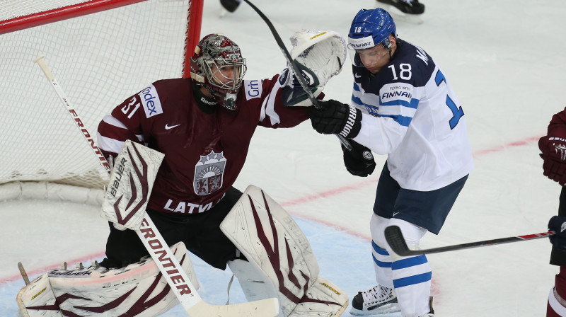 Egars Masaļskis un Tūka Mentile pasaules čempionātā (2014) 
Foto:  ITAR-TASS / Scanpix
