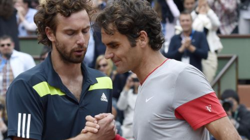Ernests Gulbis un Rodžers Federers
Foto: AFP/Scanpix