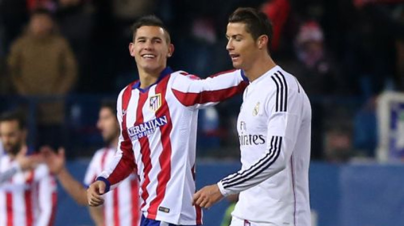 "Atletico" aizsargs Lukass Ernandess un Krištianu Ronaldu pirmās spēles izskaņā
Foto: AFP/Scanpix