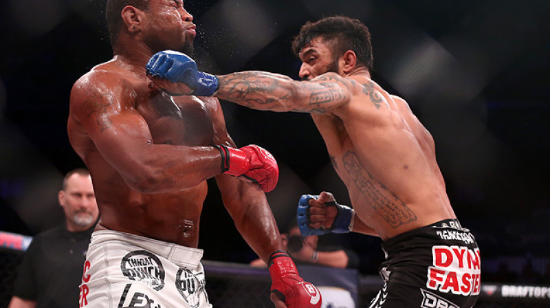 Laiems Makgīrijs (no labās) cīņā ar Emanuelu Ņūtonu
Foto: sherdog.com