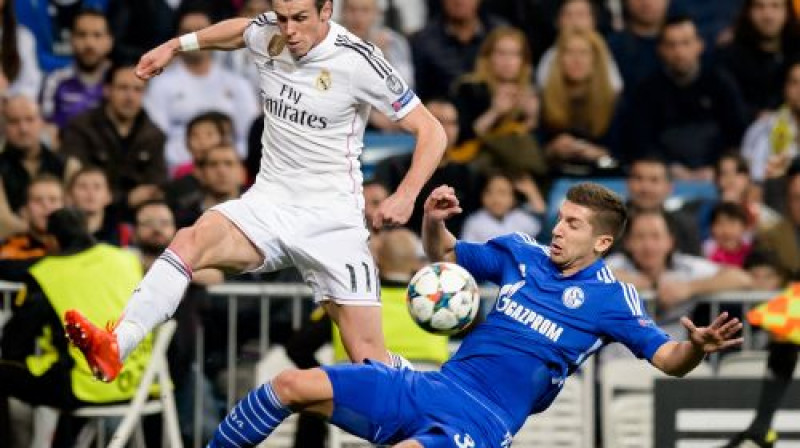 Matija Nastasičs (pa labi) Geretam Beilam vakaru Madridē sabojāja pamatīgi
Foto: AFP/Scanpix