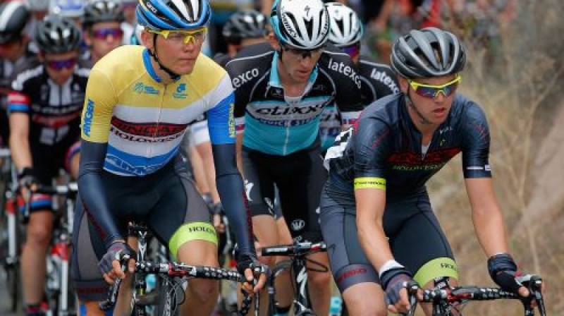 Toms Skujiņš dzeltenajā līdera krekliņā.
Foto: AFP