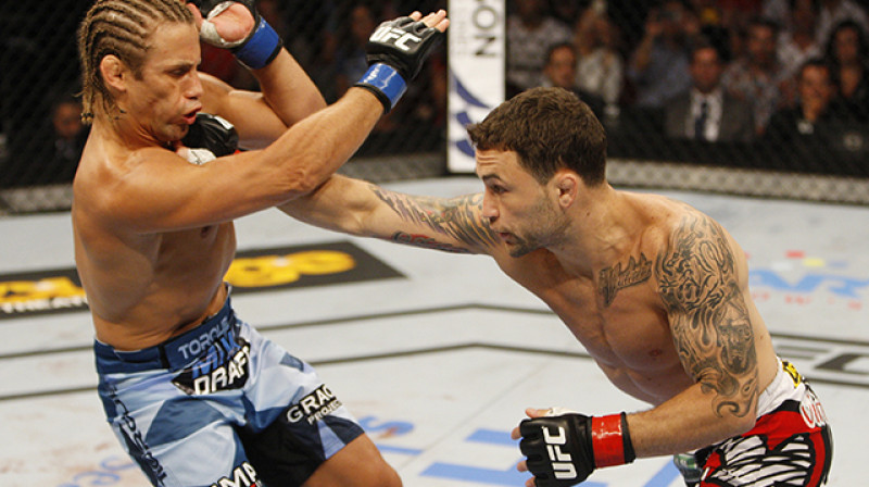 Frenkijs Edgars (no labās) cīņā ar Juraiju Feiberu
Foto: sherdog.com