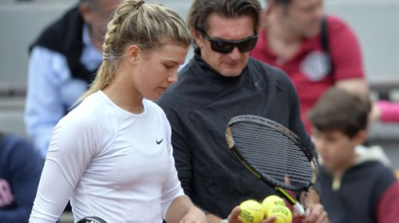 Džīnija Bušāra ar treneri Semu Sumiku
Foto: AFP/Scanpix