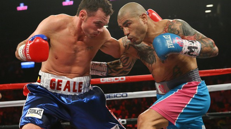 Migels Kotto (no labās) cīņā ar Danielu Gīlu
Foto: boxingscene.com