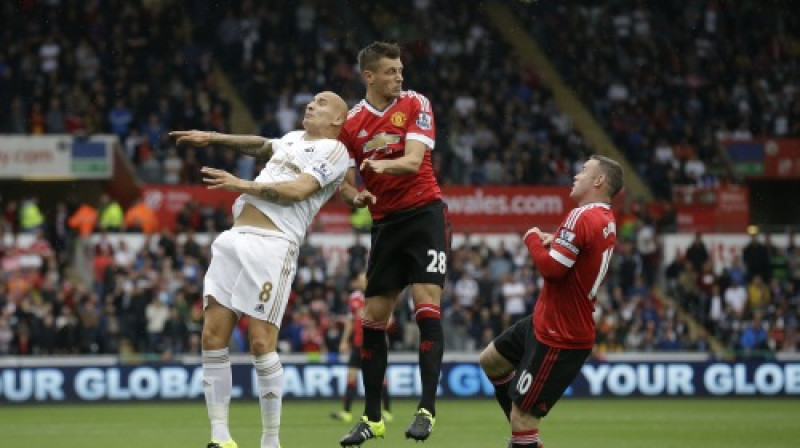 Morgans Šnaiderlins un Veins Rūnijs
Foto: AP/Scanpix
