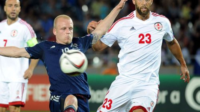 Stīvens Neismits pret Levanu Mhledlidzi
Foto: AFP/Scanpix