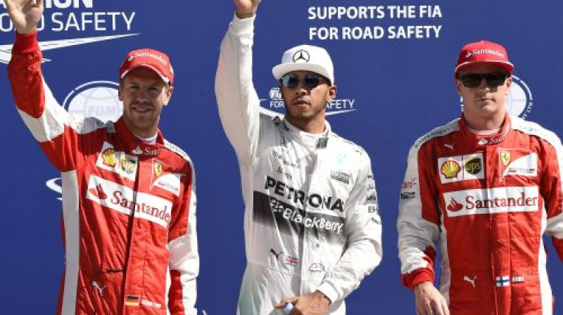 Itālijas GP kvalifikācijas pirmais trijnieks - Fetels, Hamiltons, Reikenens
Foto: AFP/Scanpix