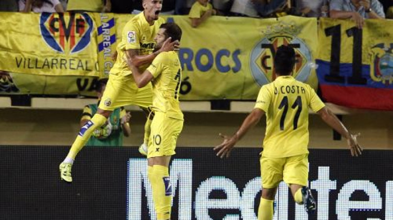 Baptistau ar komandas biedriem - "La Liga" jaunie līderi
Foto: AFP/Scanpix