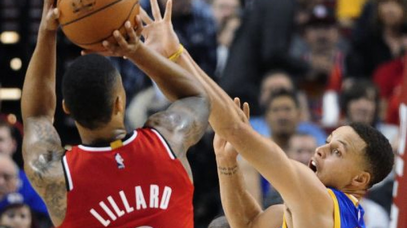 Deimians Lilards pret Stefenu Kariju
Foto: AP/Scanpix