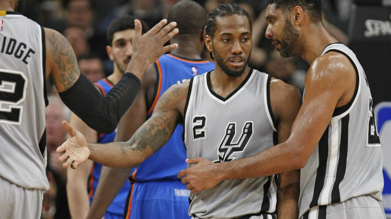 Kavai Lenards un Tims Dankans 
Foto: AFP/Scanpix