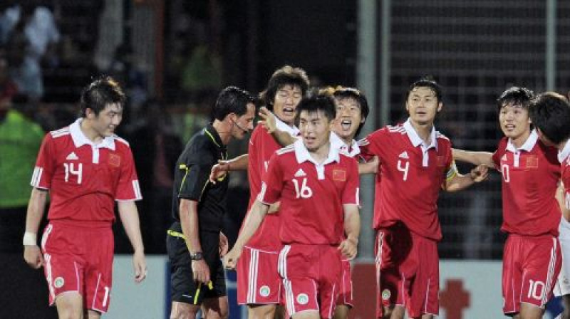 Ķīnas futbola izlases futbolisti
Foto: AFP/Scanpix
