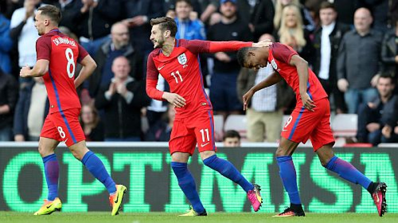 Markuss Rešfords (pa labi) pēc vārtu guvuma
Foto: AFP/Scanpix