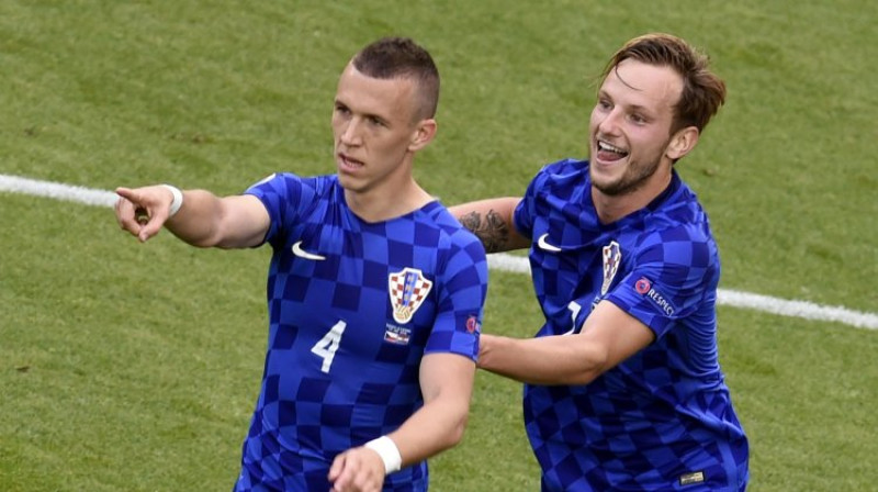 Iepriekšējās spēles vārtu autori Ivans Perišičs un Ivans Rakitičs
Foto: AFP/Scanpix