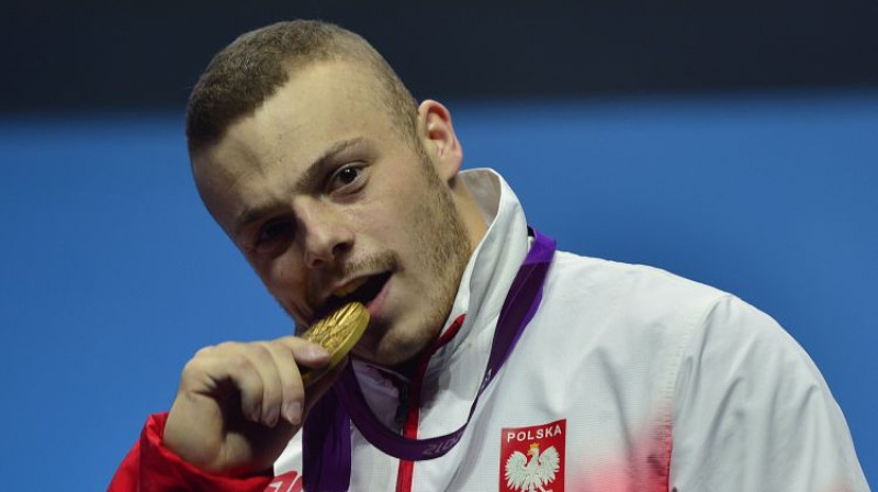 Adrians Zeļinskis 2012. gada olimpisko spēļu apbalvošanas ceremonijā
Foto: AFP/Scanpix