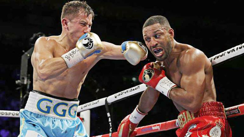 Genādijs Golovkins (no kreisās) cīņā ar Kelu Brūku
Foto: boxingnewsonline.net