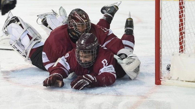 Jānis Voris un Andrejs Kostjuks
Foto: Andrea Cardin/HHOF-IIHF Images