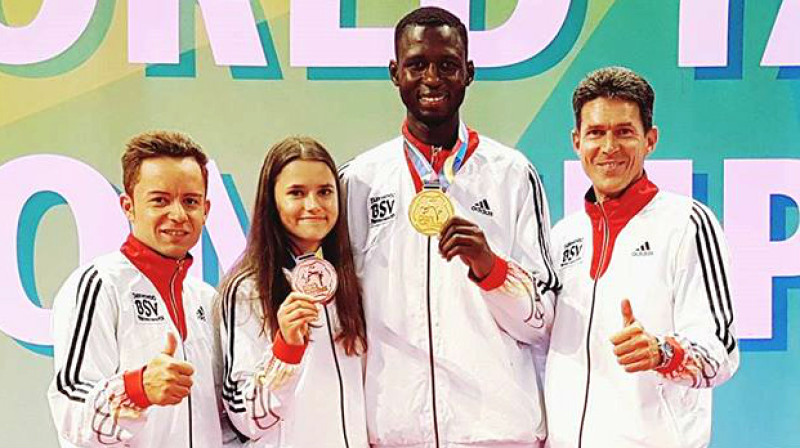Treneris Boriss Vinklers (Vācija), Inese Tarvida (Latvija), Abduls Razaks Isufu (Nigēra), galvenais treneris Markuss Kolefels (Vācija) 
Foto: TCC Friedrichshafen