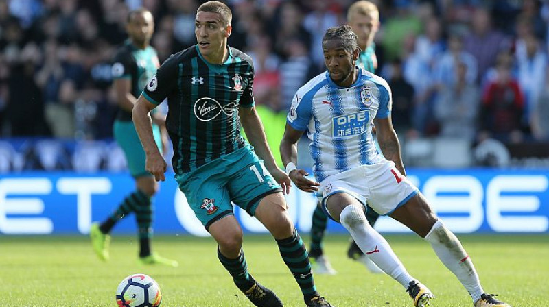 Oriols Romeu un Keisijs Palmers 
Foto: PA Wire/Scanpix