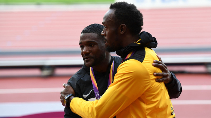 Džastins Getlins un Juseins Bolts
Foto: AFP/Scanpix