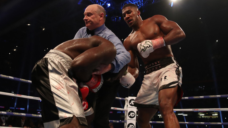 Karloss Takama un Entonijs Džošua 
Foto: PA Wire / Scanpix