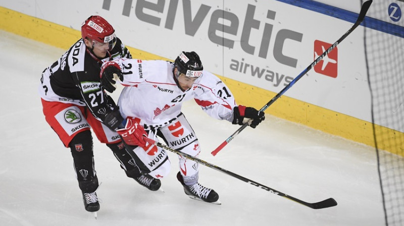 Oskars Cibuļskis cīņā ar Krisu Kelliju
Foto: EPA/Scanpix
