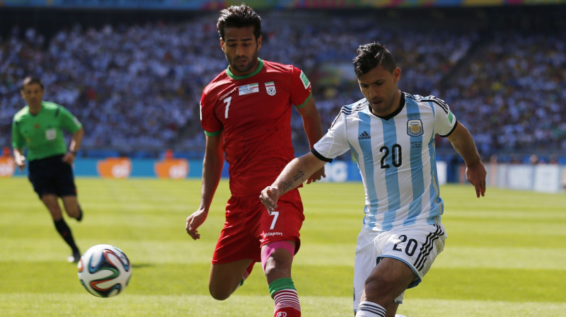 Masuds Šodžaejs un Serhio Agvero
Foto: Reuters/Scanpix