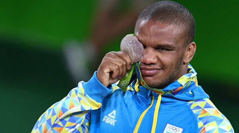 Žans Beļeņuks ar olimpisko medaļu 
Foto: Aleksandrs Viļfs, ria.ru/olympics2016