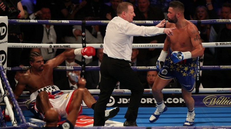 Deivids Hejs, ringa tiesnesis un Tonijs Beljū
Foto: AFP/Scanpix