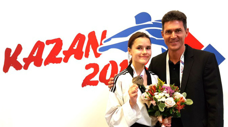 Inese Tarvida un treneris Markuss Kolefels 
Foto: tcc-friedrichshafen.de