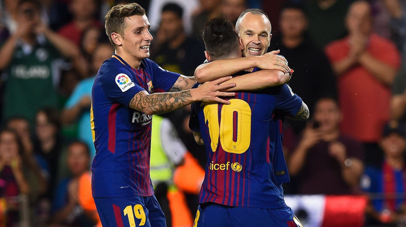 Luka Diņs kopā ar Andresu Injestu un Lionelu Mesi
Foto: AFP/Scanpix