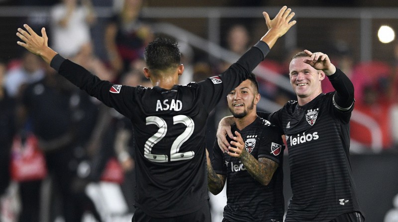 Veins Rūnijs kopā ar komandas biedriem
Foto: AP/Scanpix