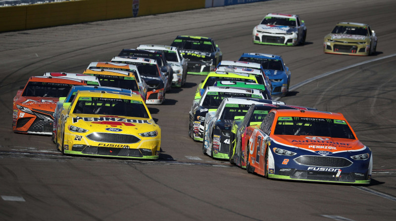 Breds Keslovskis savā auto (priekšplānā)
Foto: AFP/Scanpix