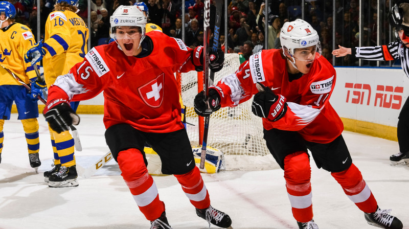 Šveices hokejisti pēc vārtu guvuma
Foto: IIHF.com
