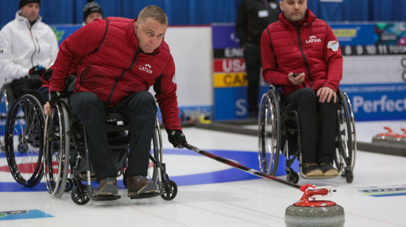 Latvijas ratiņkērlinga izlases spēlētāji
No kreisās: Ojārs Briedis, Agris Lasmans
Foto: WCF/Tom Rowland