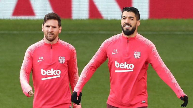 Lionels Mesi un Luiss Svaress treniņā Mančestrā. Foto: EPA/Scanpix