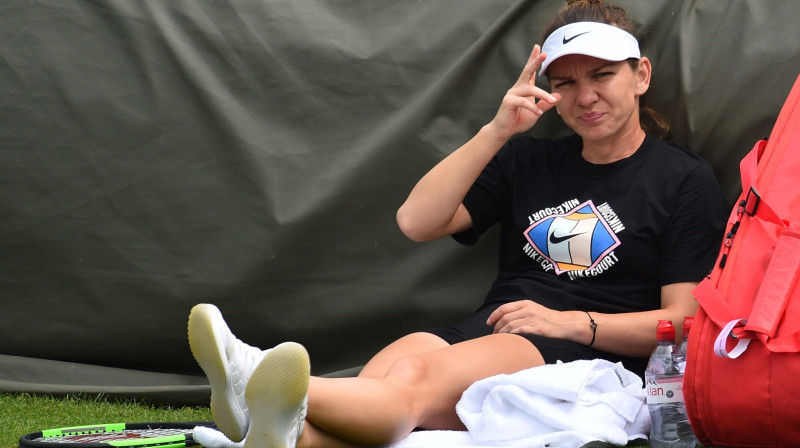 Simona Halepa bauda treniņu. Foto: AFP/Scanpix