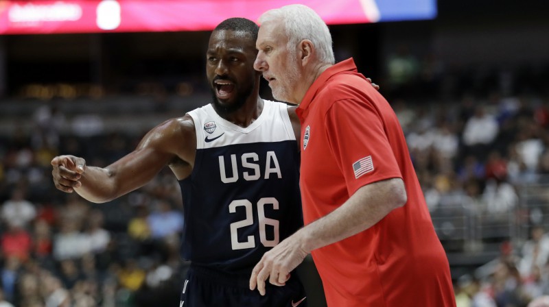 Kemba Vokers un Gregs Popovičs. Foto: AP/Scanpix