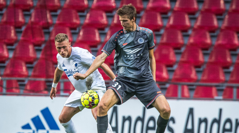 Elvis Stuglis (priekšplānā). Foto: Zigismunds Zālmanis/Riga FC