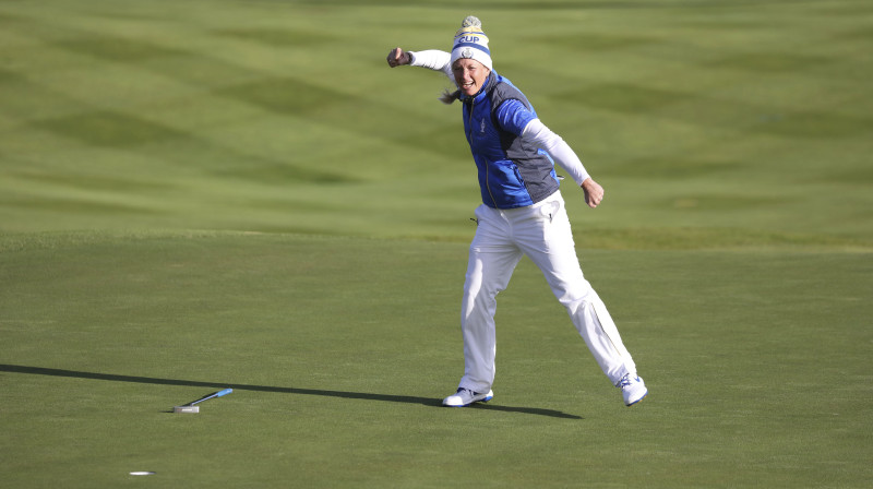 Suzanna Petersena mirkli pēc "Solheim Cup" uzvarošā sitiena. Foto: AP/Scanpix