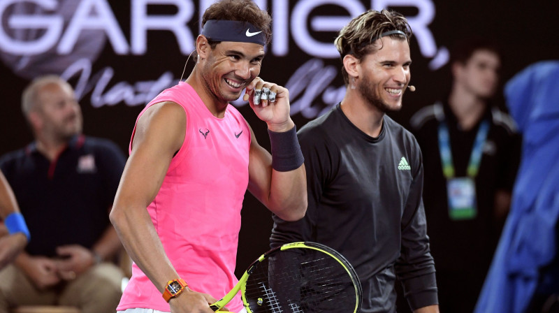 Rafaels Nadals un Dominiks Tīms labdarības pasākumā dažas dienas pirms turnīra sākuma. Foto: AFP/Scanpix