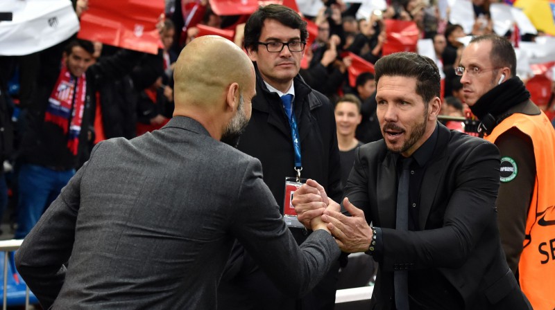 Žuzeps Gvardiola un Djego Simeone. Foto: AFP/Scanpix