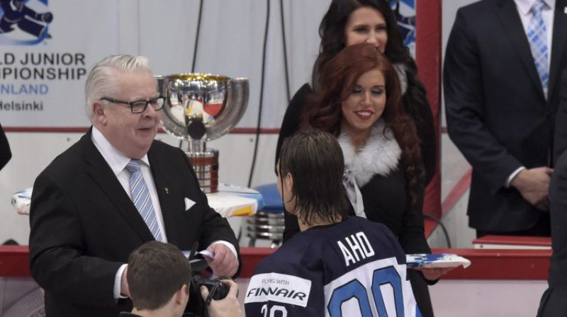 Kalervo Kummola (pa kreisi). Foto: AP/Scanpix