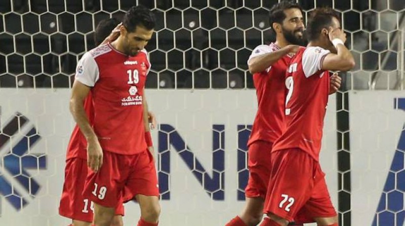 "Persepolis" futbolisti priecājas par vārtu guvumu. Foto: AFP/Scanpix