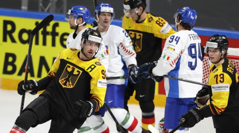 Vācijas izlase PČ pirmajā dienā pret Itāliju. Foto: AP/Scanpix